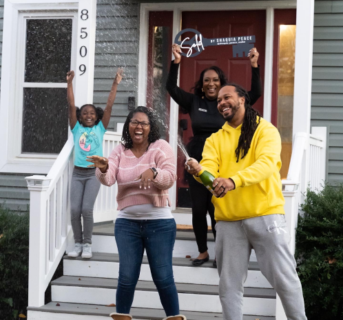 Shaquia Peace with a Happy Client at Closing – Successful Real Estate Deal